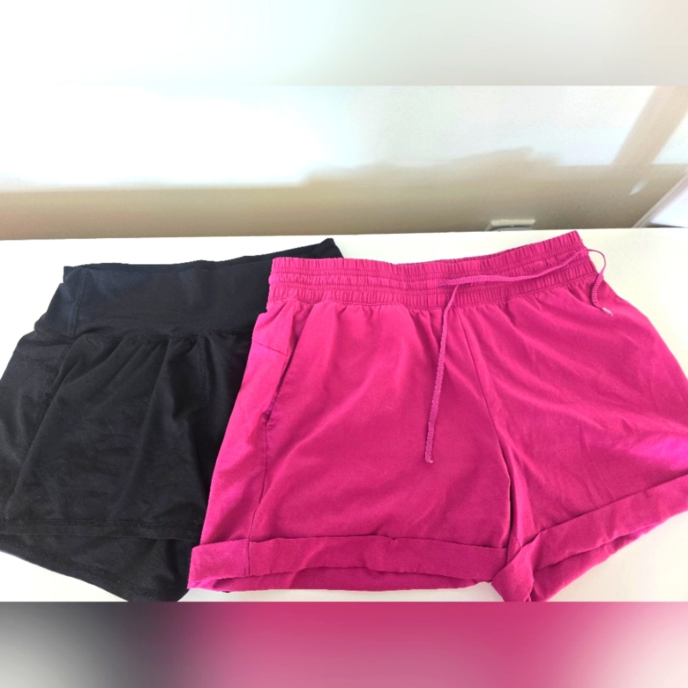 Two pairs of Joe Fresh Active shorts black and magenta size small